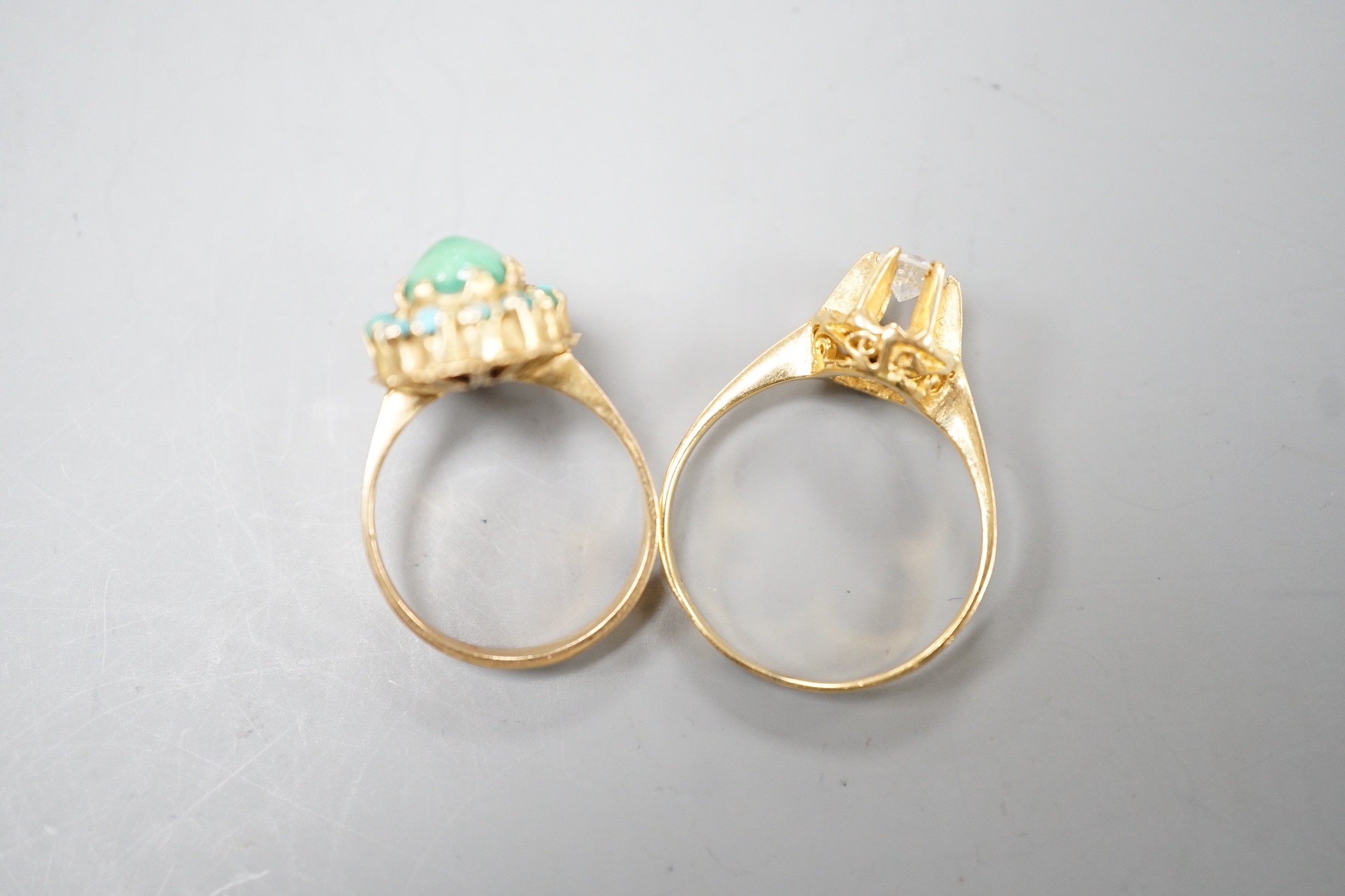 Two 750 yellow metal and gem set rings, turquoise cluster and simulated diamond, gross weight 7.4 grams, (stone missing).